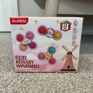 New In Box: Sensory Spinners and Poppers for Baby